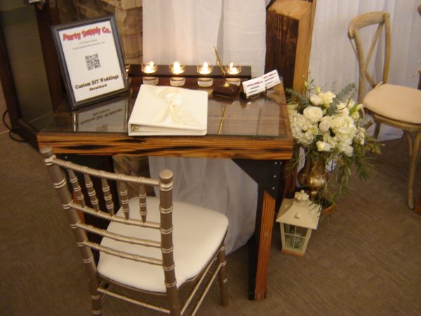 Gold Chiavari Chair shown with 200 Year old Douglas Fir signing table.