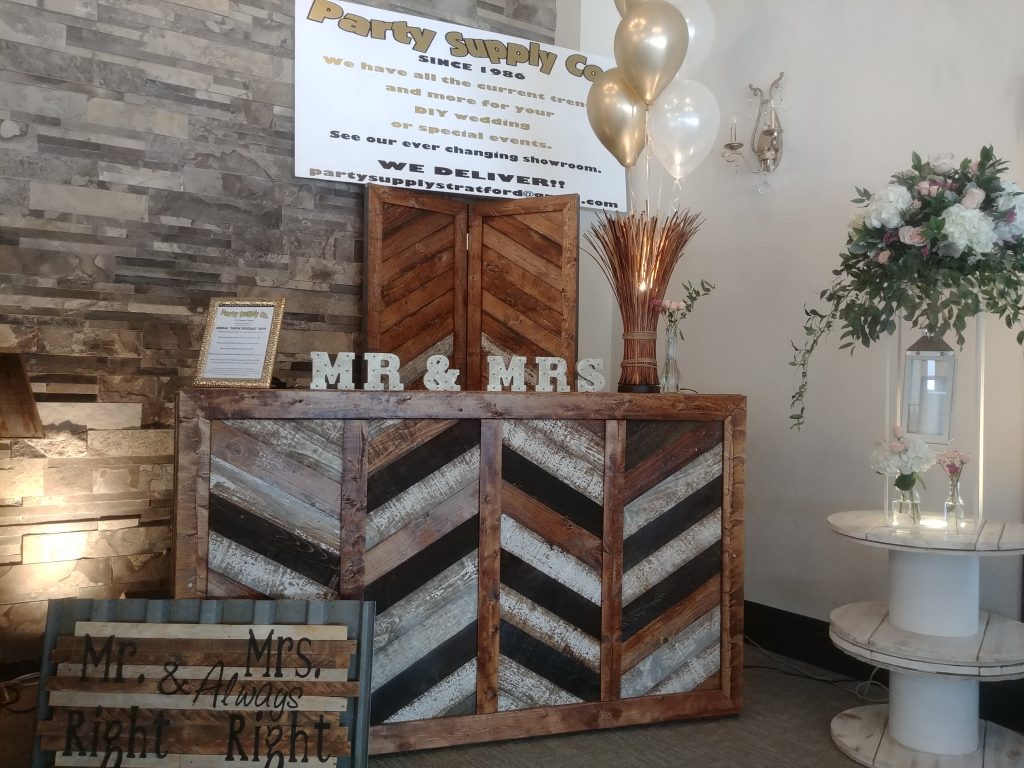 Reception Bar with Chevron paels and an L shape attachment for ice bucket.