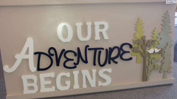 Signage "Our Adventure Begins" Party Supply Co.